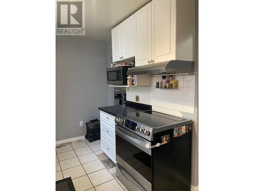 4711 Spruce Avenue, Fort Nelson, BC - Indoor Photo Showing Kitchen