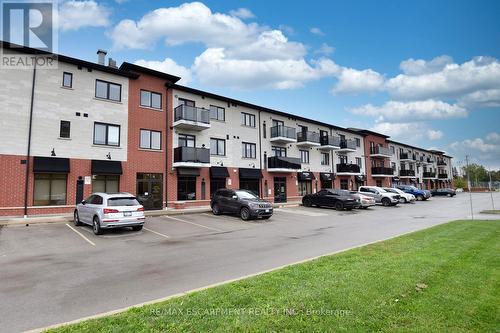 320 - 170 Rockhaven Lane, Hamilton, ON - Outdoor With Balcony With Facade