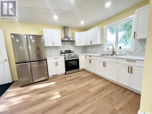 16 Kemp Crescent, Prince Albert, SK - Indoor Photo Showing Kitchen With Double Sink