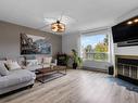 Salon - 5-11111 Rue Meighen, Montréal (Pierrefonds-Roxboro), QC  - Indoor Photo Showing Living Room With Fireplace 