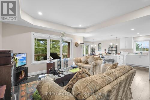 11 Cattail Crescent, Quinte West, ON - Indoor Photo Showing Living Room With Fireplace