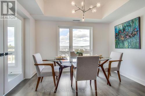 318 - 4 Spice Way, Barrie, ON - Indoor Photo Showing Dining Room