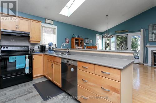 55 Riverbank Drive, St. Thomas, ON - Indoor Photo Showing Kitchen With Fireplace With Double Sink