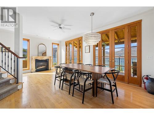 414 Herbert Heights Road, Kelowna, BC - Indoor Photo Showing Dining Room With Fireplace