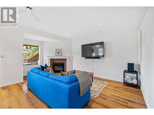 414 Herbert Heights Road, Kelowna, BC - Indoor Photo Showing Living Room With Fireplace