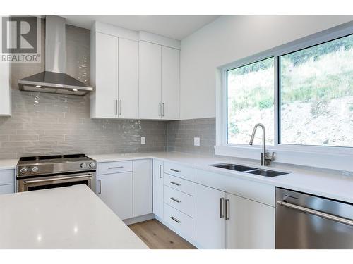 2822 Copper Ridge Drive, West Kelowna, BC - Indoor Photo Showing Kitchen With Double Sink