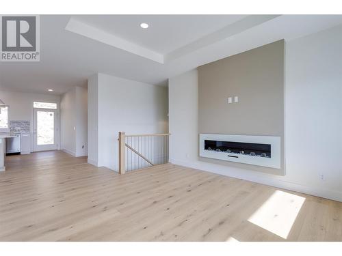 2822 Copper Ridge Drive, West Kelowna, BC - Indoor Photo Showing Living Room With Fireplace