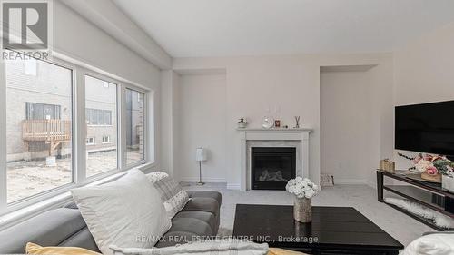 53 George Brier Drive E, Brant, ON - Indoor Photo Showing Living Room With Fireplace