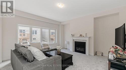 53 George Brier Drive E, Brant, ON - Indoor Photo Showing Living Room With Fireplace