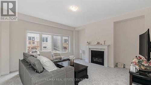 53 George Brier Drive E, Brant, ON - Indoor Photo Showing Living Room With Fireplace