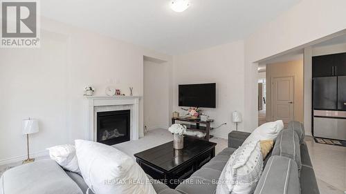 53 George Brier Drive E, Brant, ON - Indoor Photo Showing Living Room With Fireplace