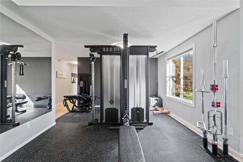 7901 Kalview Drive, Coldstream, BC - Indoor Photo Showing Gym Room