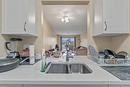 403-3304 35 Avenue, Vernon, BC  - Indoor Photo Showing Kitchen With Double Sink 