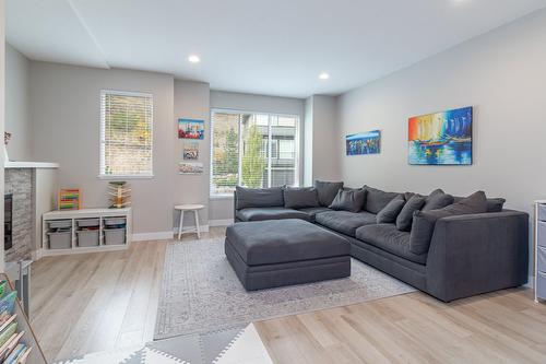 76-2490 Tuscany Drive, West Kelowna, BC - Indoor Photo Showing Living Room With Fireplace