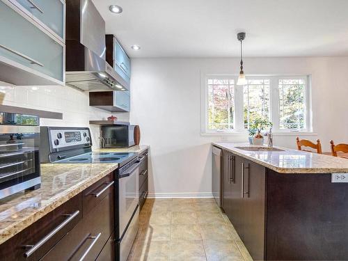 Kitchen - 135 Rue St-Jean, Saint-Calixte, QC - Indoor Photo Showing Kitchen With Upgraded Kitchen