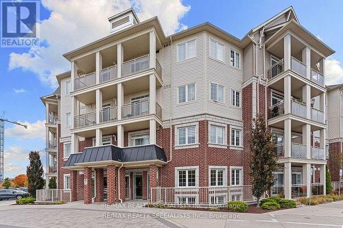 #413 - 84 Aspen Springs Drive, Clarington, ON - Outdoor With Facade