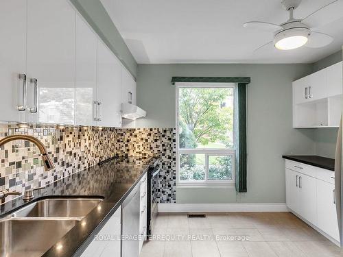 77-705 Burnhamthorpe Rd, Toronto, ON - Indoor Photo Showing Kitchen With Double Sink