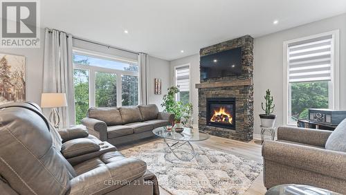 39 Gibbons Street, Norfolk, ON - Indoor Photo Showing Living Room With Fireplace