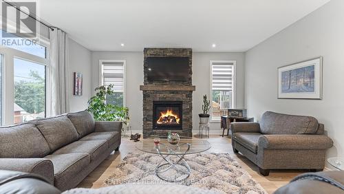 39 Gibbons Street, Norfolk, ON - Indoor Photo Showing Living Room With Fireplace