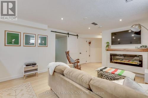 10 Fraser Drive, Stratford, ON - Indoor Photo Showing Living Room With Fireplace