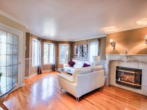 Living room - 190 Rue Acher, Laval (Sainte-Dorothée), QC - Indoor Photo Showing Living Room With Fireplace