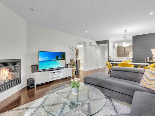 Salon - 3911 Rue Antoine-Bedwani, Laval (Chomedey), QC - Indoor Photo Showing Living Room With Fireplace