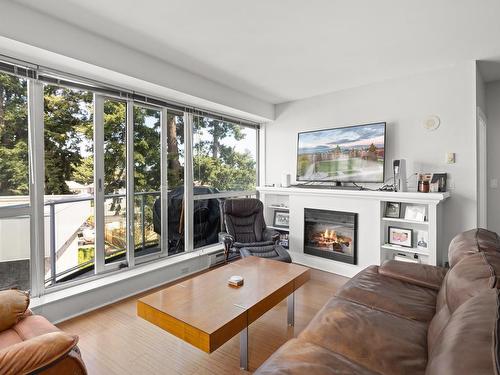 313-2745 Veterans Memorial Pkwy, Langford, BC - Indoor Photo Showing Living Room With Fireplace