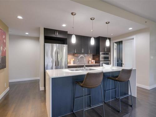 206-999 Burdett Ave, Victoria, BC - Indoor Photo Showing Kitchen With Double Sink With Upgraded Kitchen