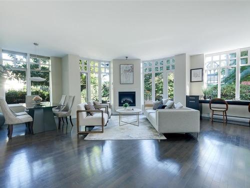 206-999 Burdett Ave, Victoria, BC - Indoor Photo Showing Living Room With Fireplace