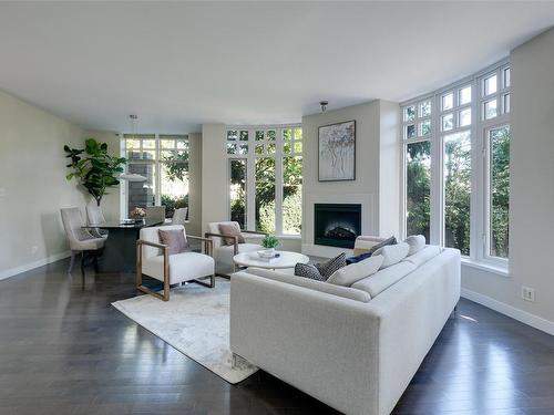 206-999 Burdett Ave, Victoria, BC - Indoor Photo Showing Living Room With Fireplace