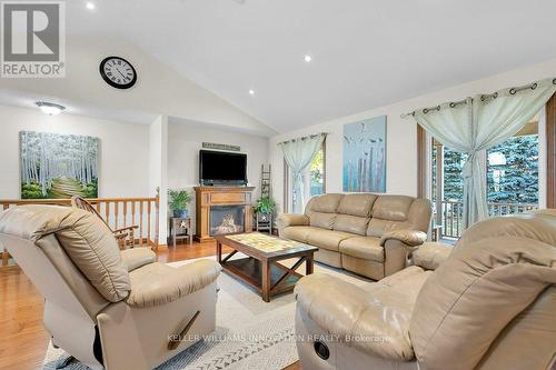 745 Wellington Avenue S, North Perth, ON - Indoor Photo Showing Living Room With Fireplace