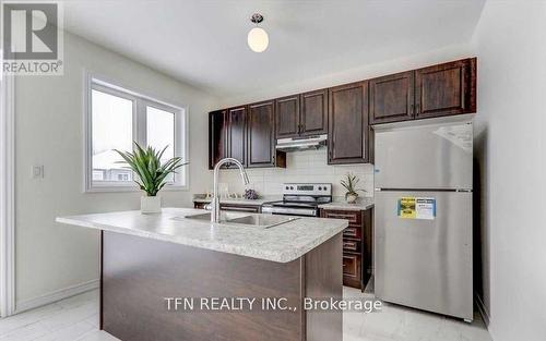 15 Simona Avenue, Wasaga Beach, ON - Indoor Photo Showing Kitchen With Double Sink