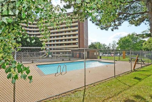 311 - 3577 Derry Road E, Mississauga, ON - Outdoor With In Ground Pool