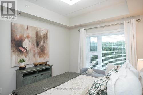 126 - 610 Farmstead Drive, Milton, ON - Indoor Photo Showing Bedroom