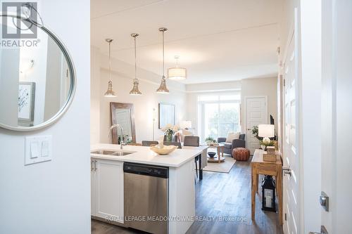 126 - 610 Farmstead Drive, Milton, ON - Indoor Photo Showing Kitchen With Double Sink