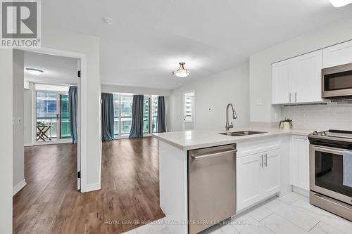 709 - 30 Grand Trunk Crescent, Toronto, ON - Indoor Photo Showing Kitchen With Double Sink With Upgraded Kitchen