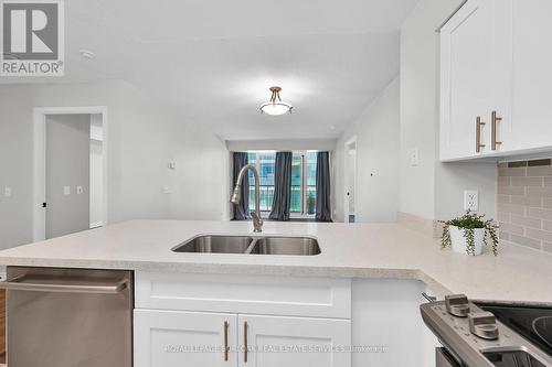 709 - 30 Grand Trunk Crescent, Toronto, ON - Indoor Photo Showing Kitchen With Double Sink