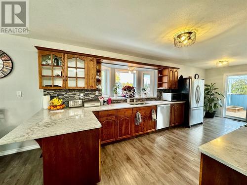 10681 Cottonwood Cresent, Dawson Creek, BC - Indoor Photo Showing Kitchen With Double Sink