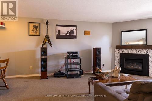 67 - 144 Conway Drive W, London, ON - Indoor Photo Showing Living Room With Fireplace