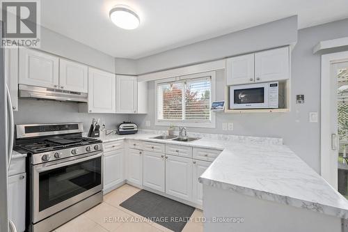 1345 Reardon Boulevard, London, ON - Indoor Photo Showing Kitchen With Double Sink