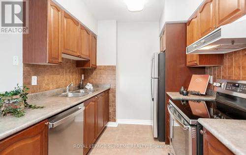 603 - 2088 Lawrence Avenue W, Toronto, ON - Indoor Photo Showing Kitchen With Double Sink