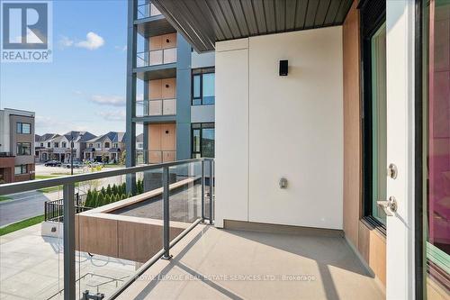 202 - 1440 Clarriage Court, Milton, ON - Outdoor With Balcony With Exterior