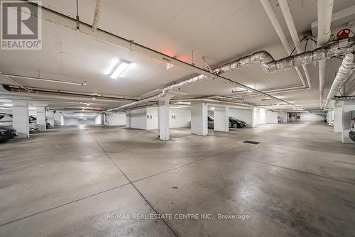 502 - 90 Charlton Avenue W, Hamilton, ON - Indoor Photo Showing Garage