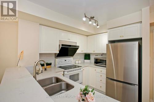 1008 - 7 Lorraine Drive, Toronto, ON - Indoor Photo Showing Kitchen With Double Sink