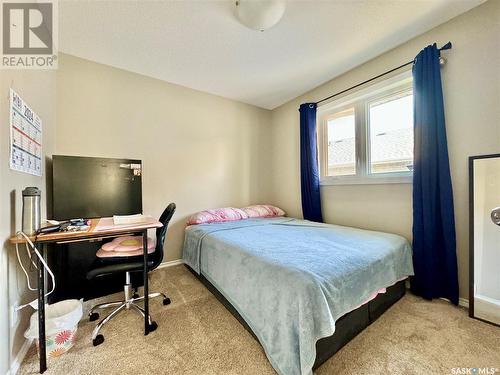 8 Cj Houston Place, Yorkton, SK - Indoor Photo Showing Bedroom