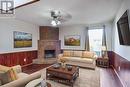 27 Rogers Road, Toronto, ON  - Indoor Photo Showing Living Room With Fireplace 