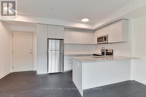 234 - 101 Cathedral High Street, Markham, ON - Indoor Photo Showing Kitchen