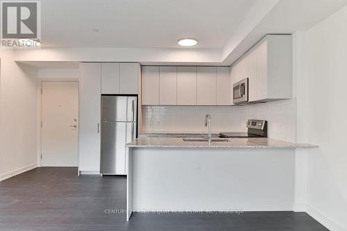 234 - 101 Cathedral High Street, Markham, ON - Indoor Photo Showing Kitchen With Stainless Steel Kitchen