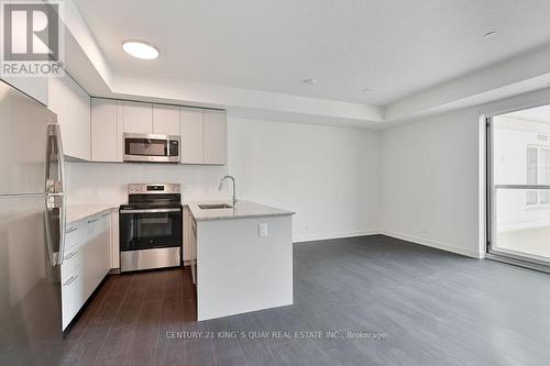 234 - 101 Cathedral High Street, Markham, ON - Indoor Photo Showing Kitchen With Stainless Steel Kitchen