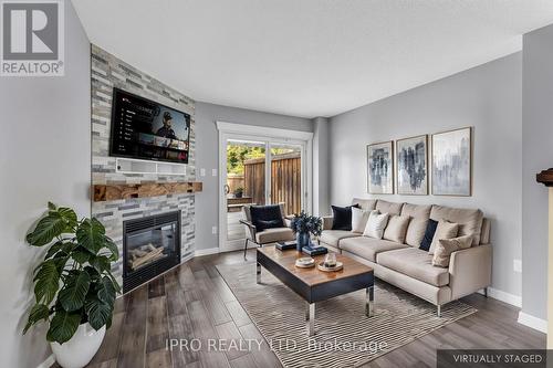 38 Gardenia Way, Caledon, ON - Indoor Photo Showing Living Room With Fireplace